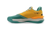 Yellow and teal basketball shoe with orange midsole, shown from the side profile against a white background